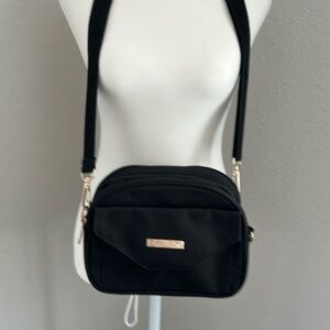 Handbag with a surprise compartment